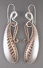 earrings, etched